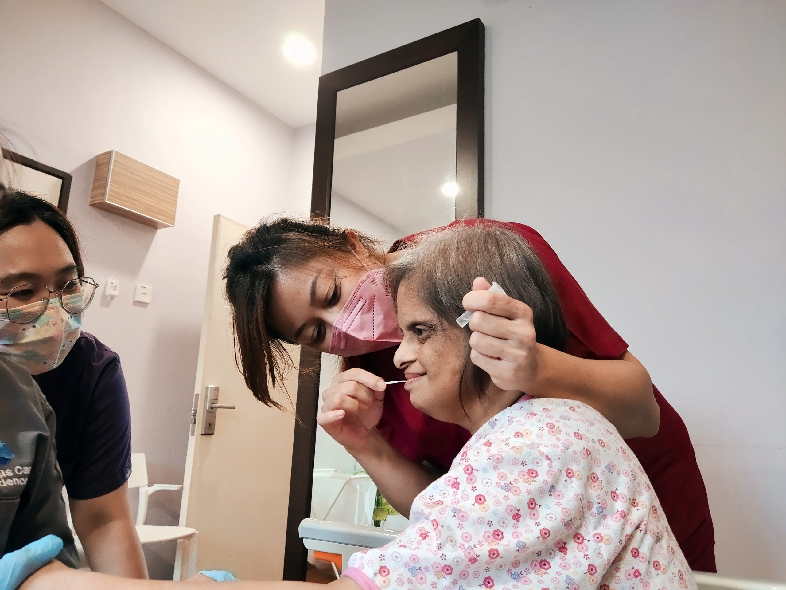 Doctor conducting medical rounds with care team